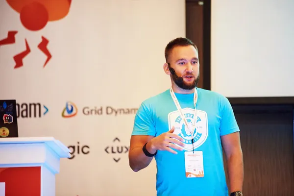 Mikalai giving a talk at JavaDay